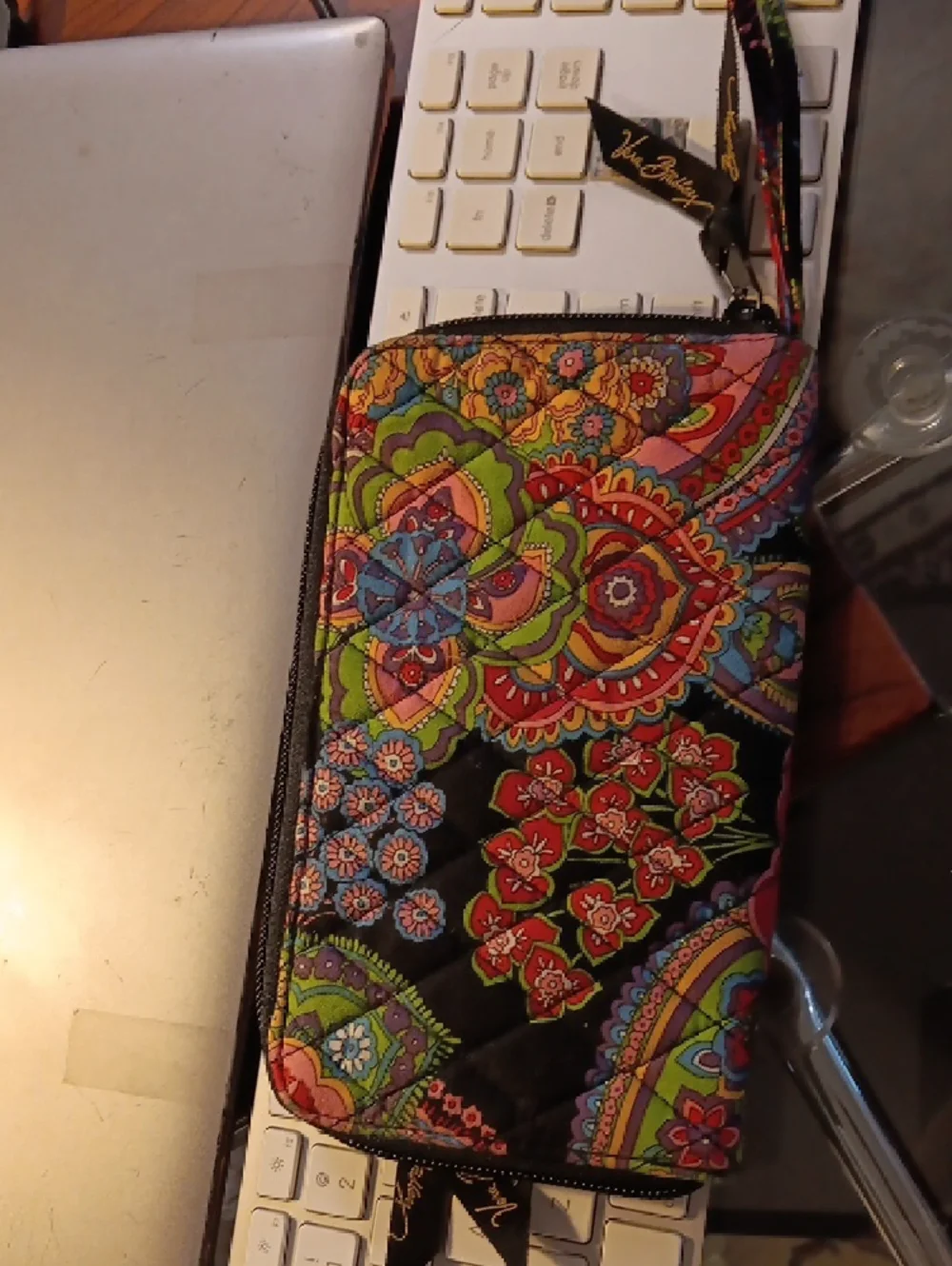 Vera Bradley zip-around wallet featuring the "Symphony in Hue" quilted Pattern - Picture 2 of 8